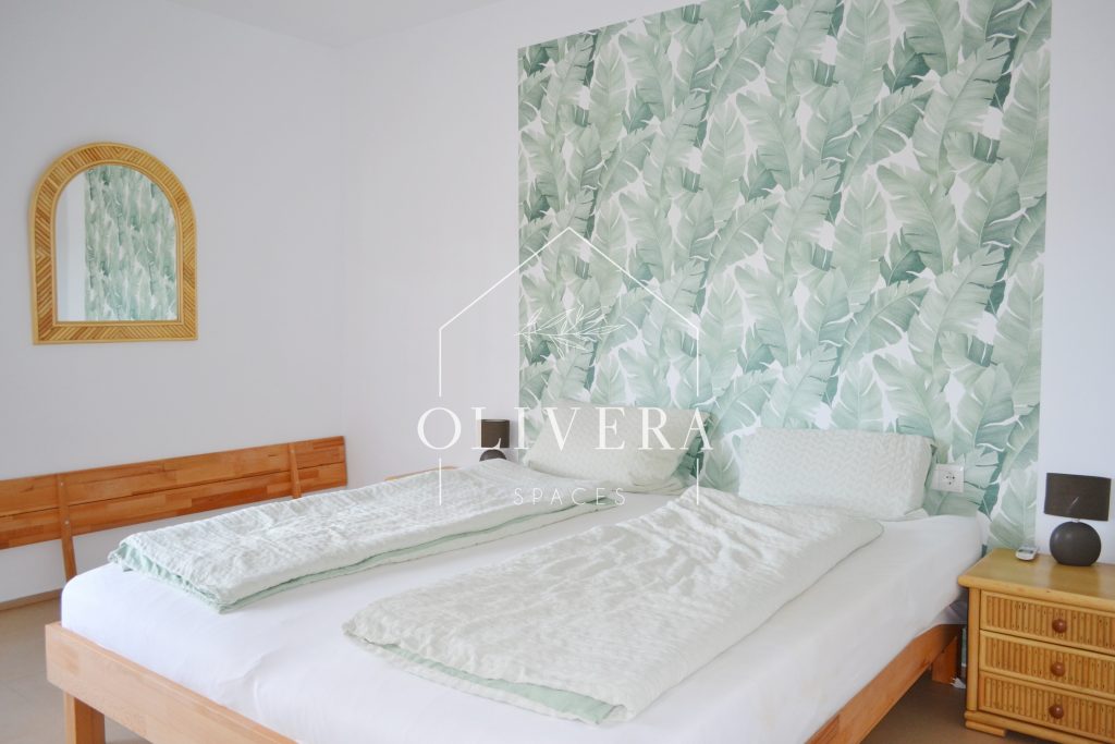 Dormitorio secundario con cama doble